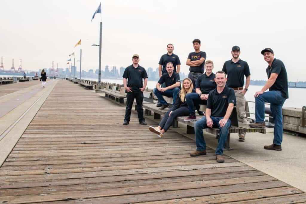 TCA Electrical Group together on a pier