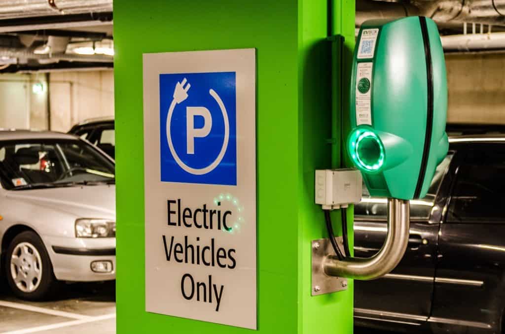 a multifamily ev charger in a parking garage