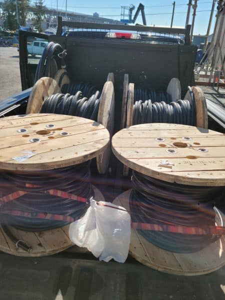 four large coils of power cables