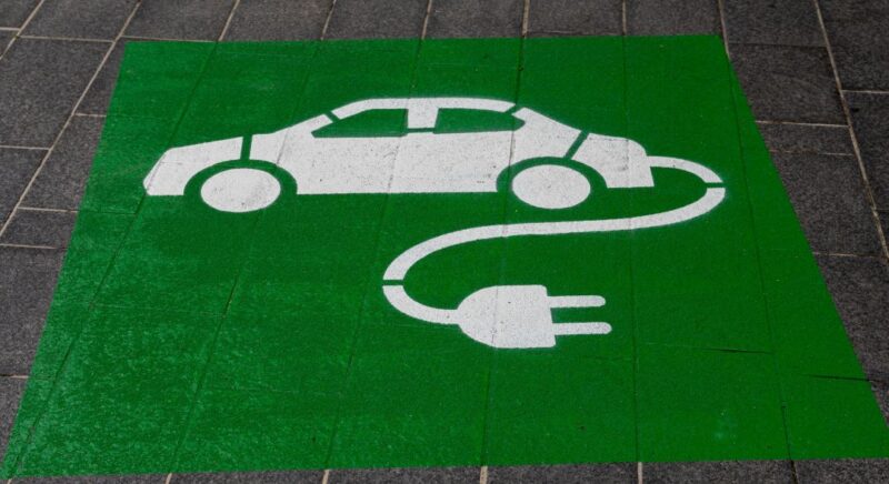 logo for a workplace EV charger parking spot