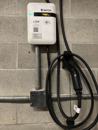 a SWTCH EV charger installed in a parking garage